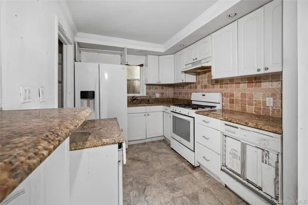 $459,950 | 99 Wilson Avenue, Amity Harbor, NY 11701