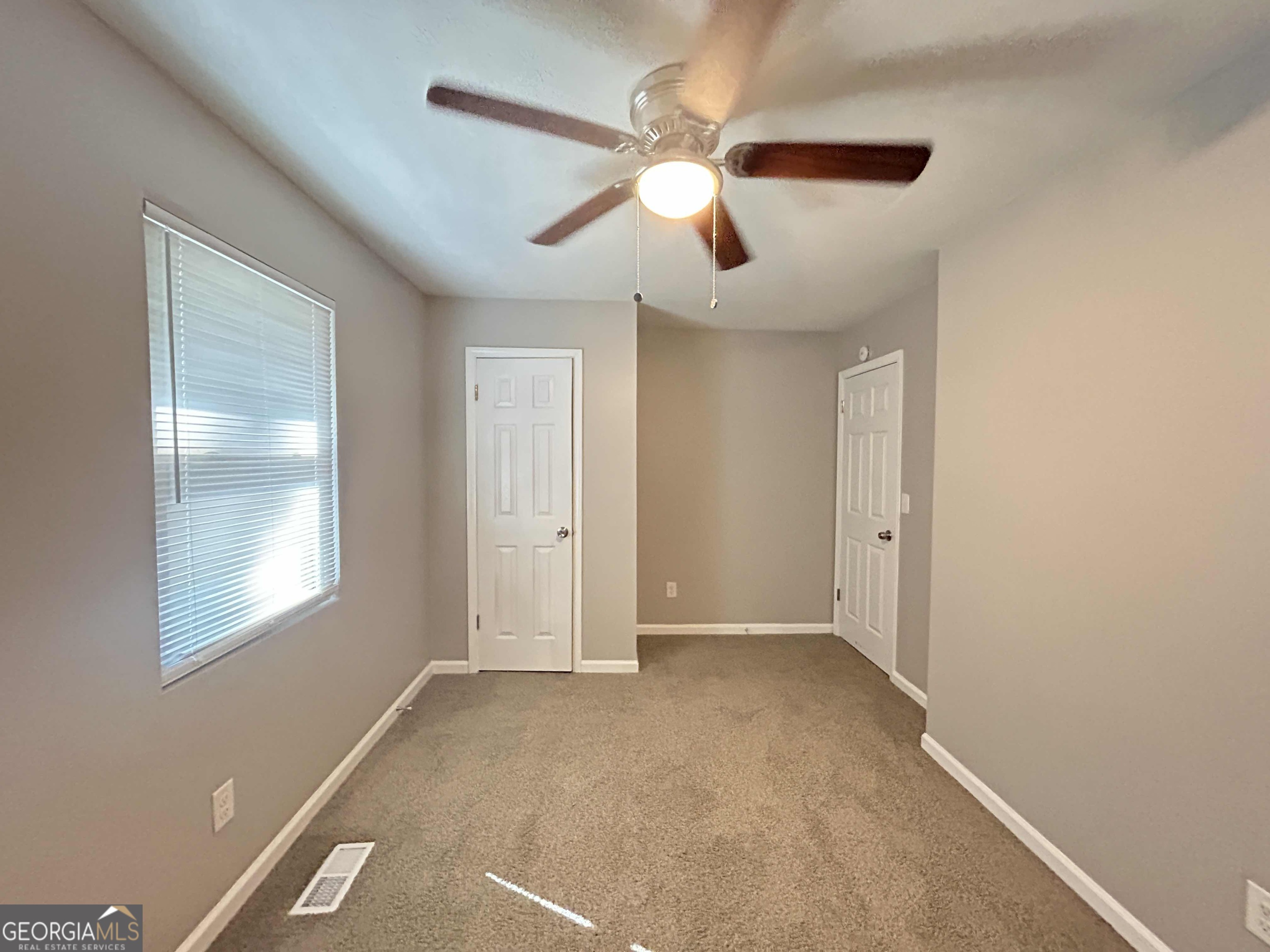 8937 Tweeddale Drive Winston, GA 30187 - Photo 14 of 26 a view of an empty room with a window