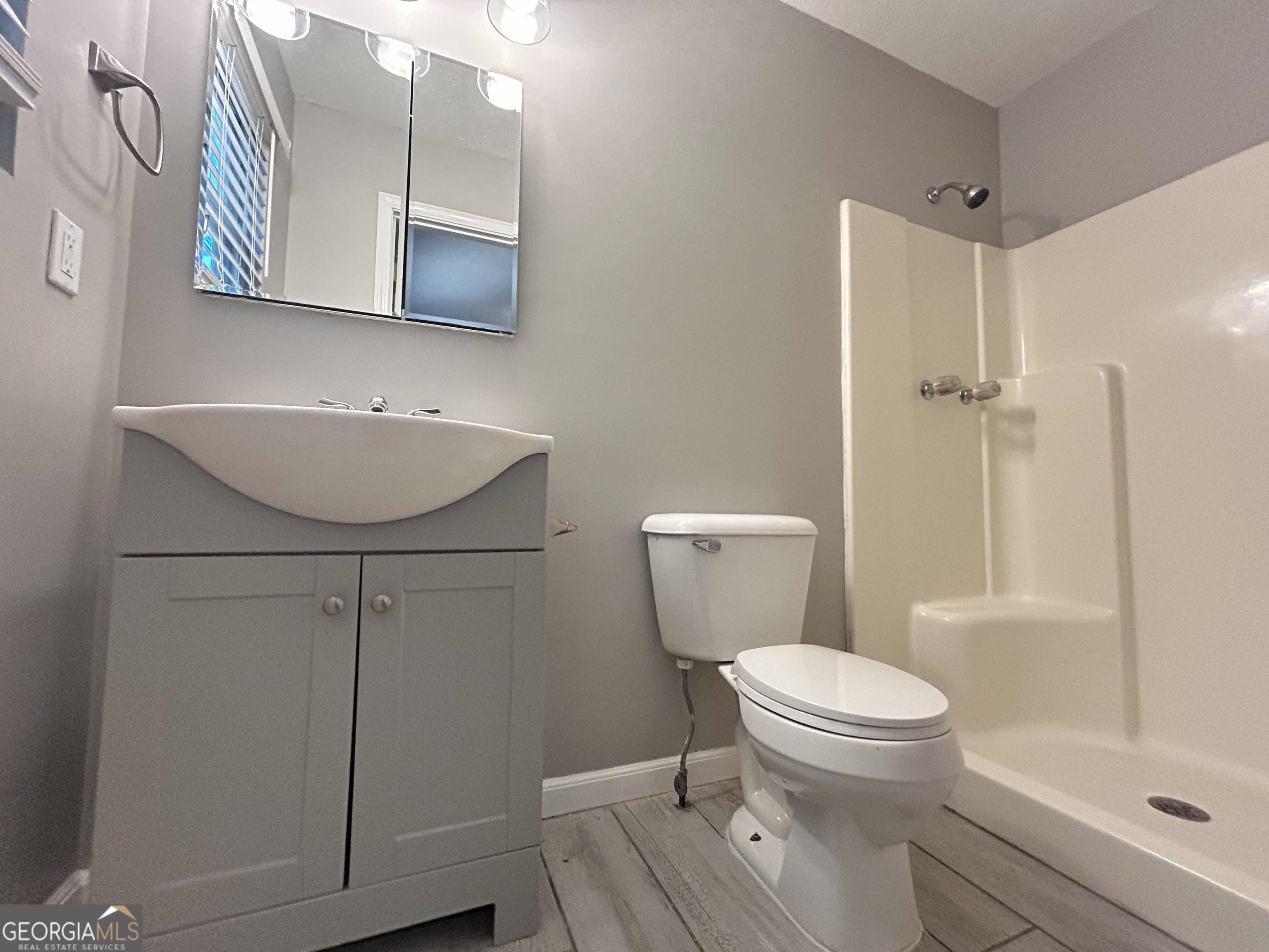 8937 Tweeddale Drive Winston, GA 30187 - Photo 21 of 26 a bathroom with a sink toilet and shower