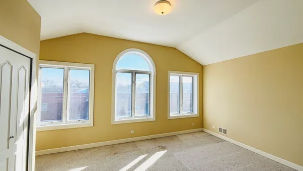 a view of a room with windows