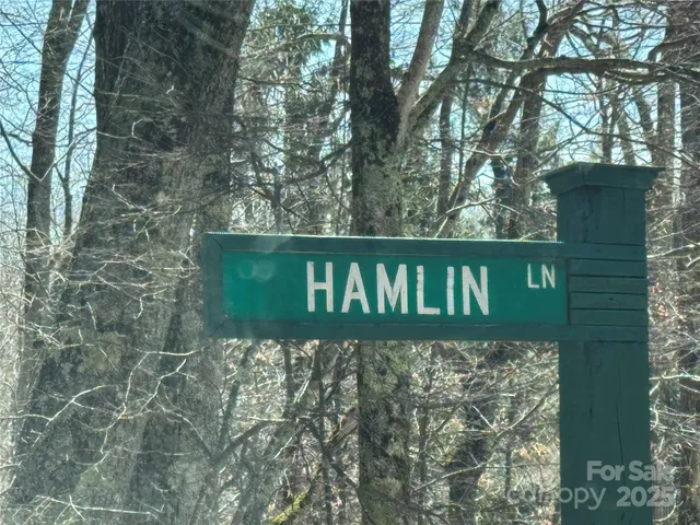 a view of a backyard of the house