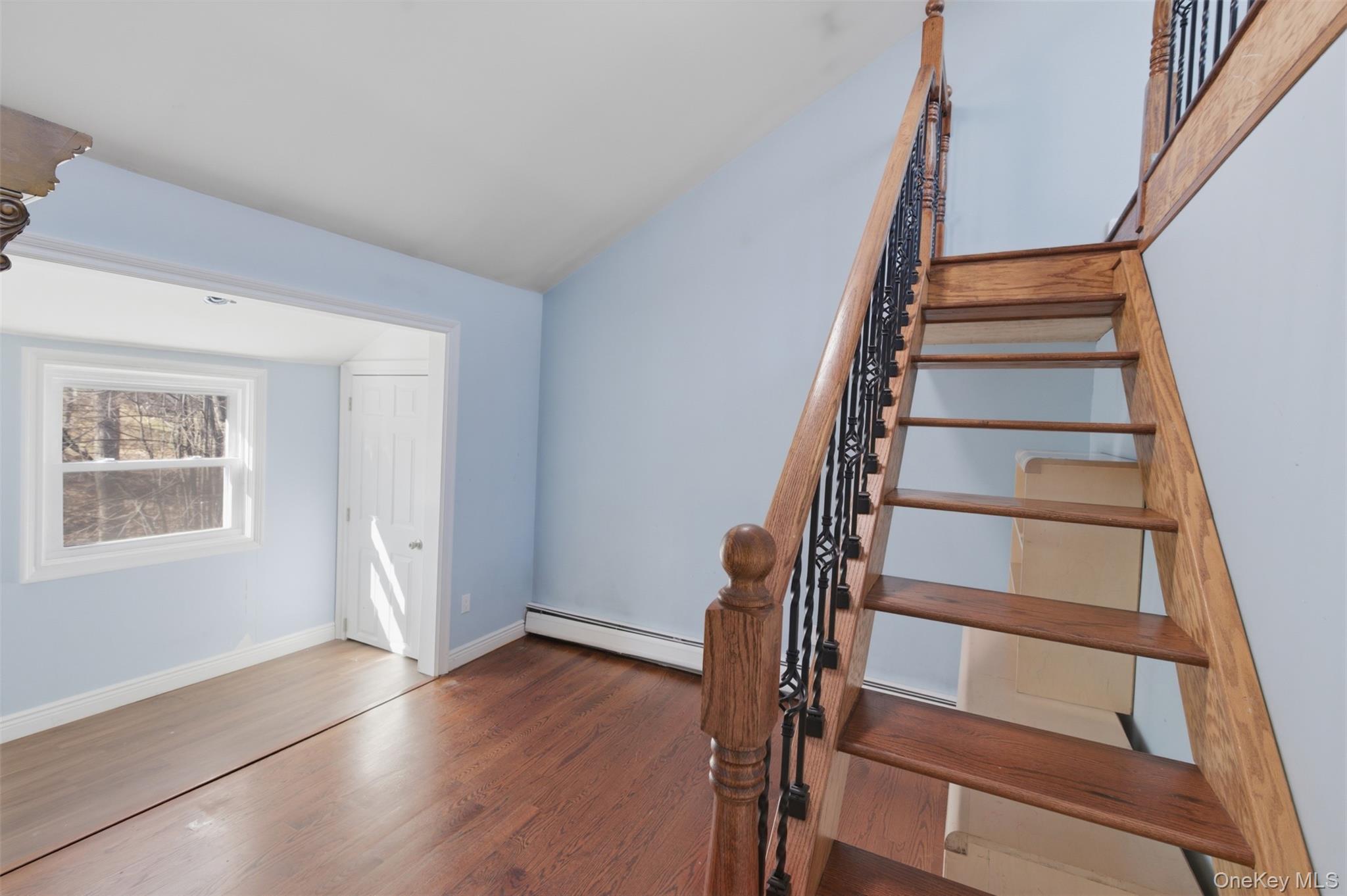41 South Monsey Road Monsey, NY 10952 - Photo 21 of 50 a view of staircase with wooden floor and white walls