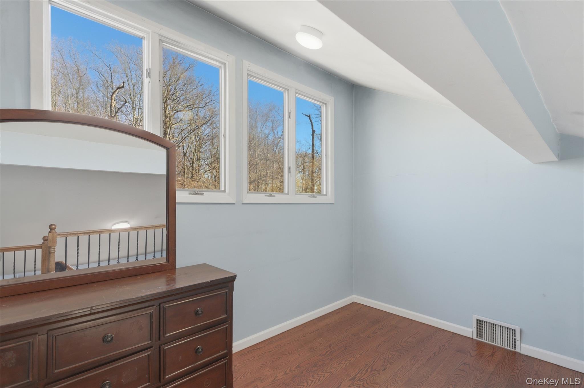 41 South Monsey Road Monsey, NY 10952 - Photo 23 of 50 a view of room with window and wooden floor