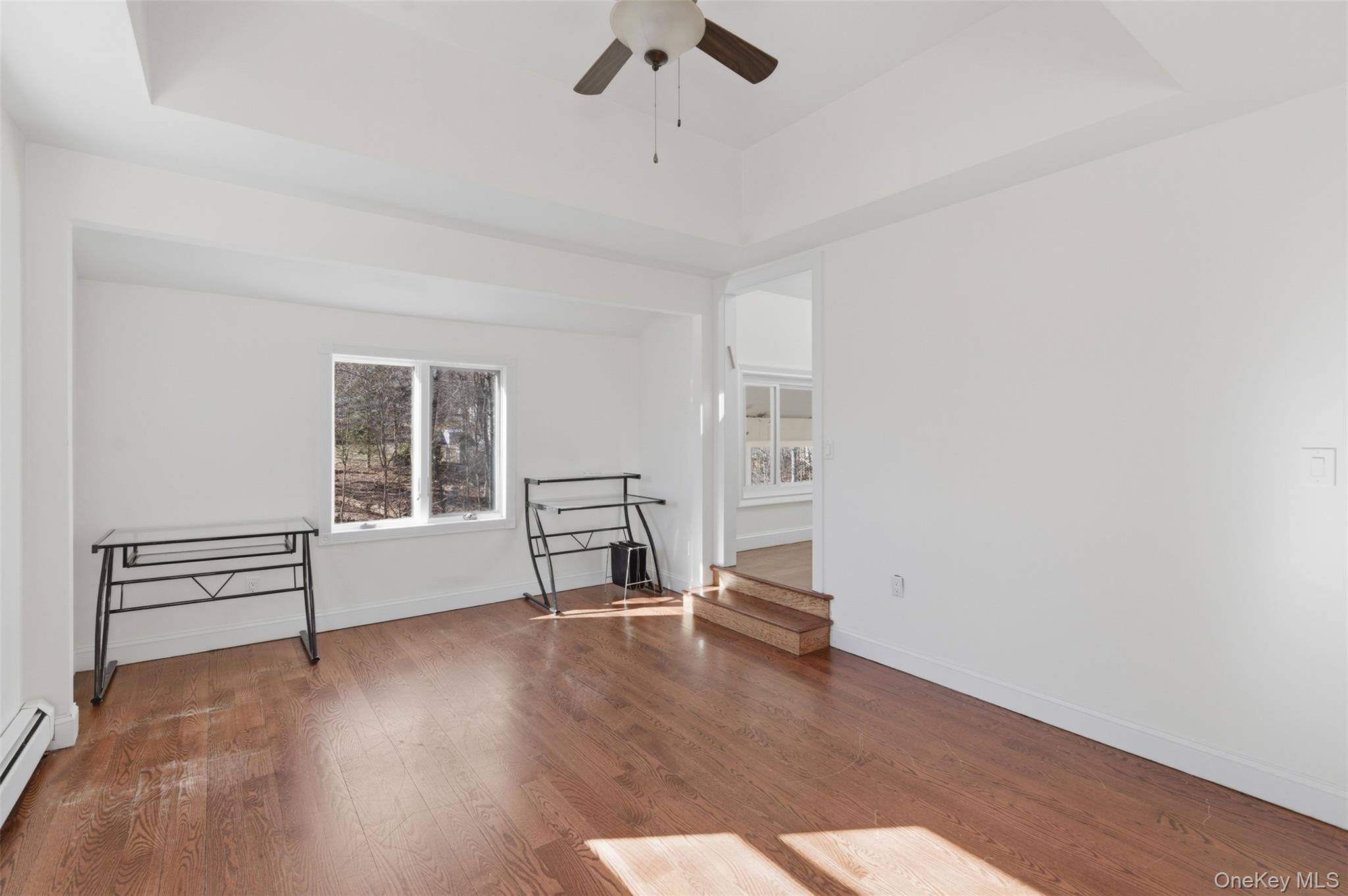 41 South Monsey Road Monsey, NY 10952 - Photo 27 of 50 wooden floor in an empty room with a window