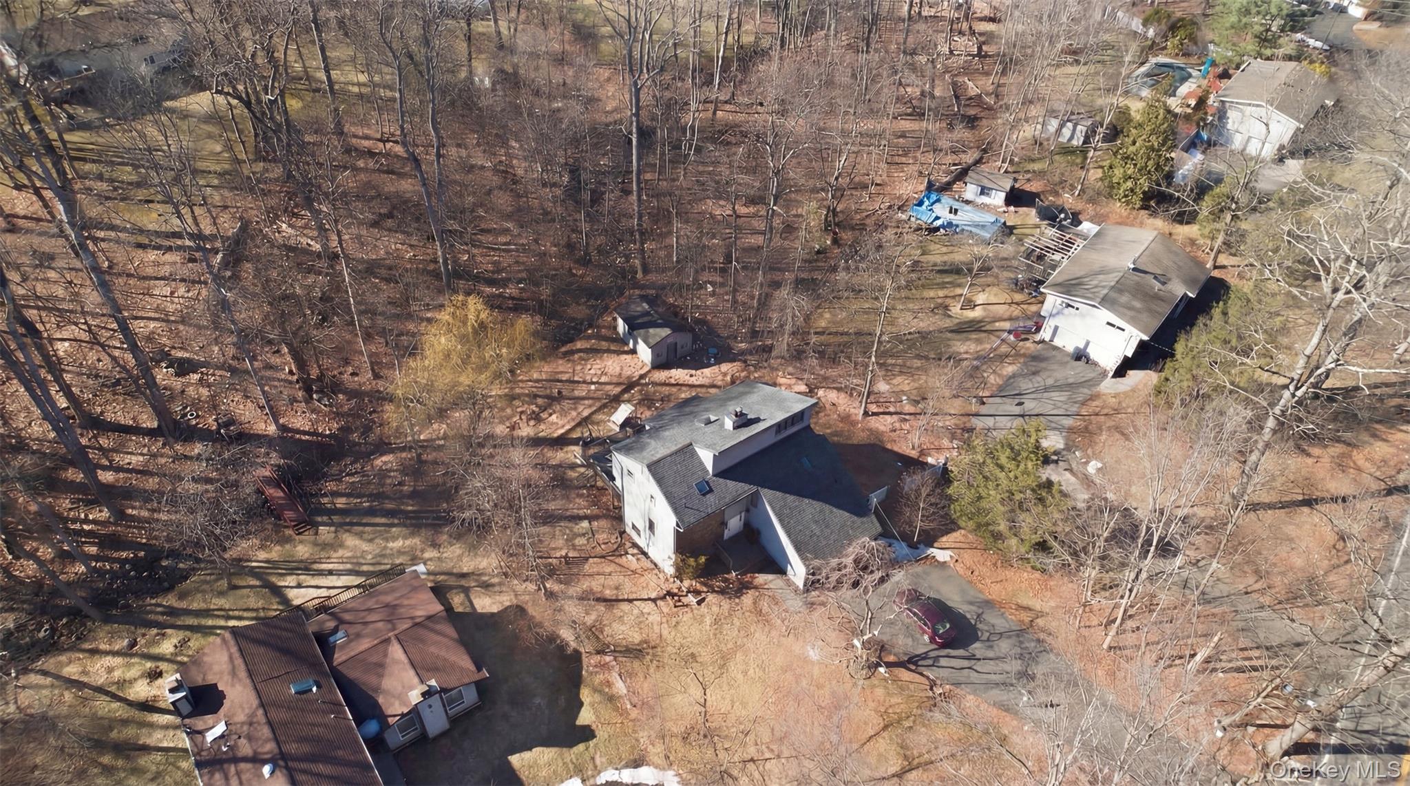 41 South Monsey Road Monsey, NY 10952 - Photo 44 of 50 a aerial view of a backyard of a house with table and chairs