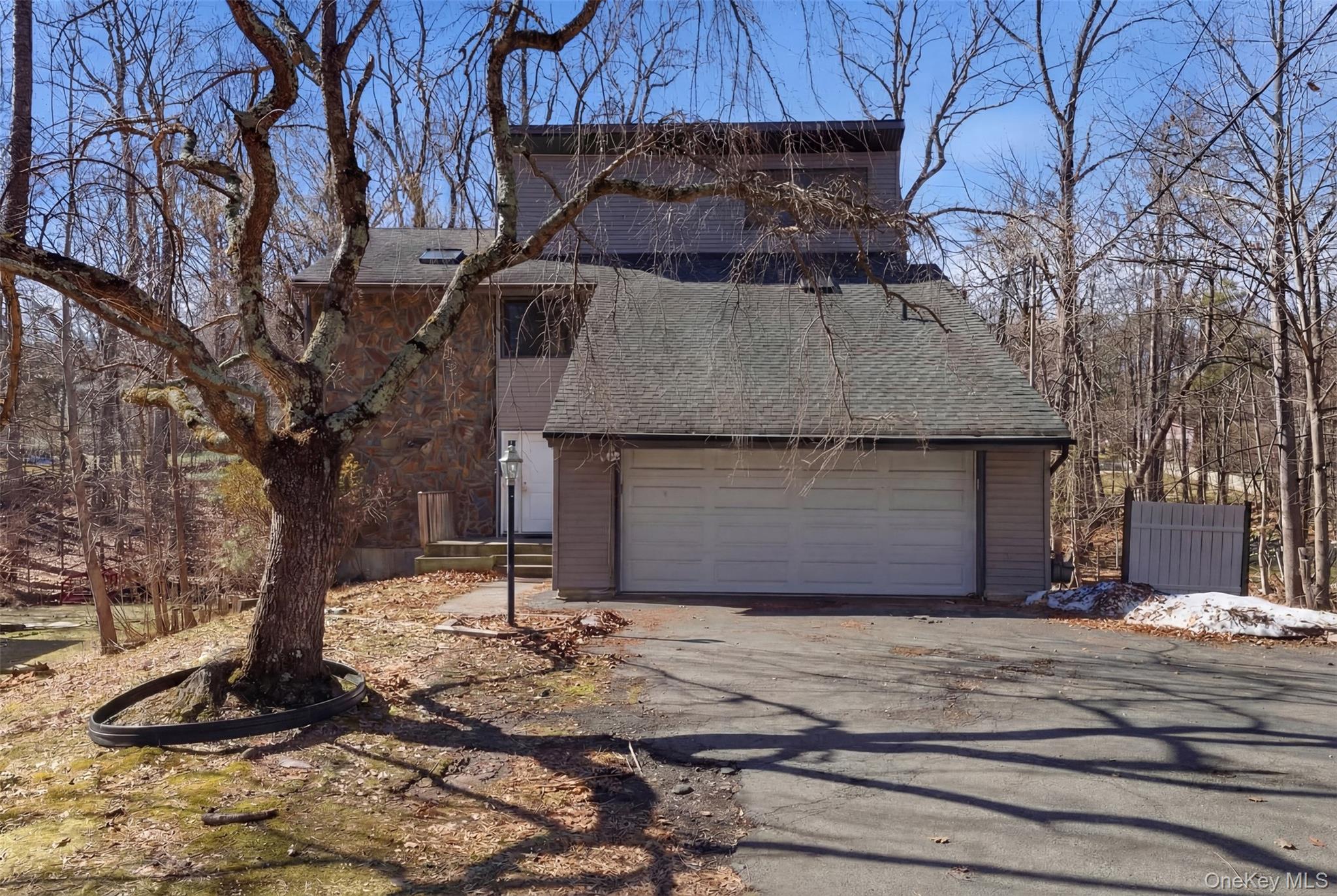41 South Monsey Road Monsey, NY 10952 - Photo 48 of 50 a front view of a house with a yard