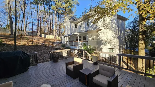 a view of couches in the balcony