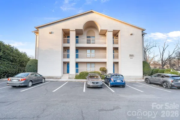 a car parked in front of a building