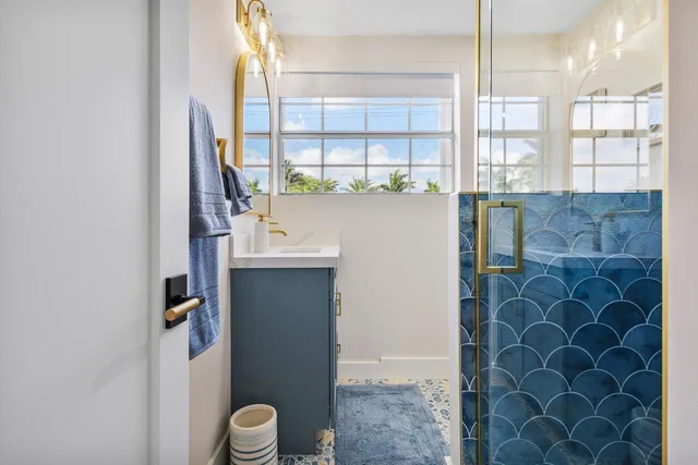 a bathroom with a sink and a mirror