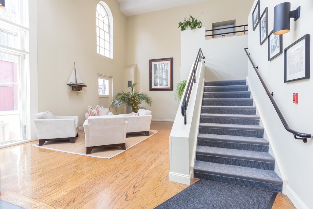 106 13th Street, Unit 204 Boston, MA 02129 - Photo 18 of 21 a living room with furniture and a fireplace