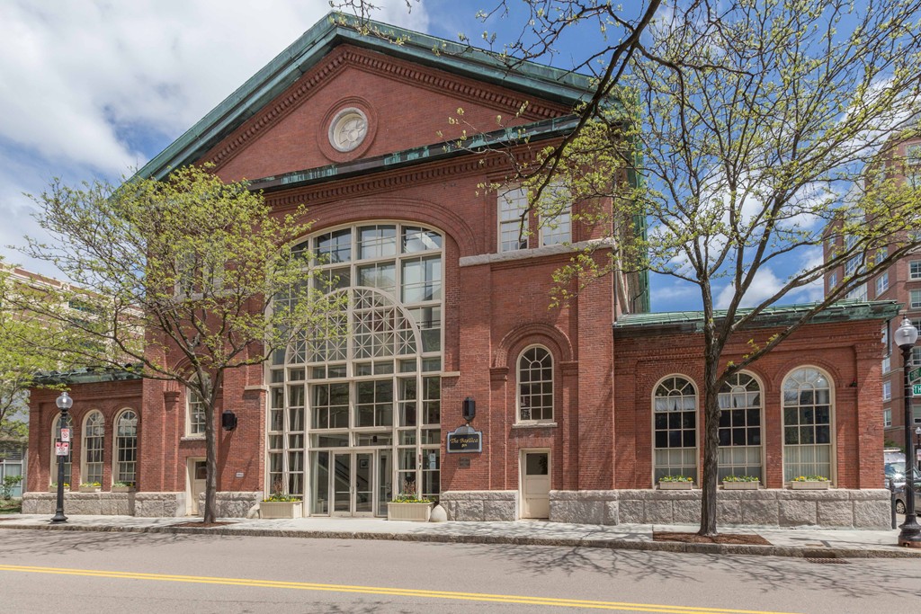 106 13th Street, Unit 204 Boston, MA 02129 - Photo 20 of 21 front view of a house with a small yard