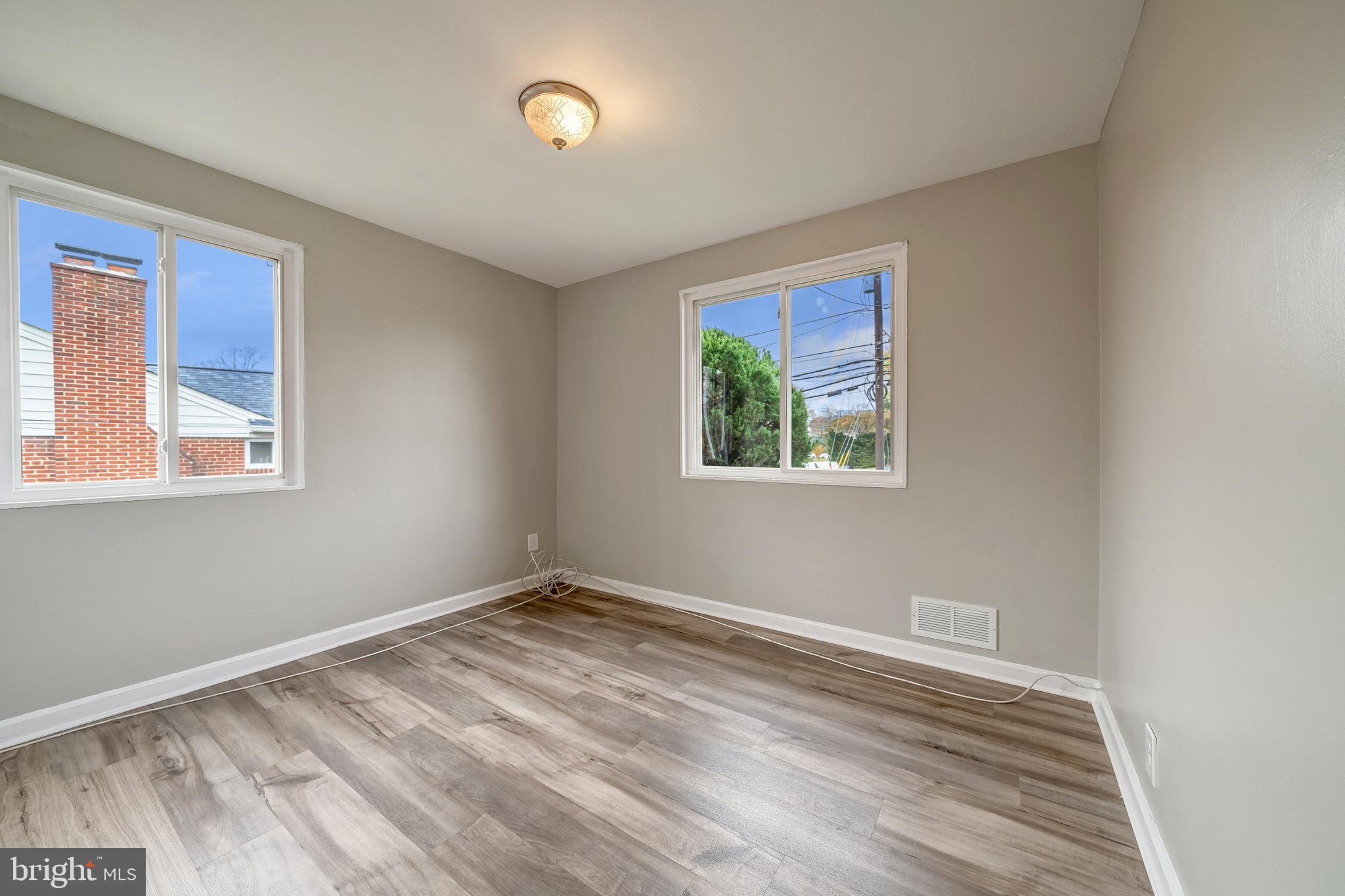 3614 Randolph Road Silver Spring, MD 20902 - Photo 15 of 39 a view of room with window and wooden floor