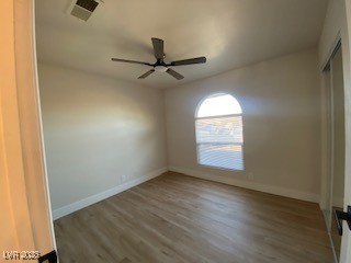 2712 Rialto Road Las Vegas, NV 89108 - Photo 46 of 54 Spare room featuring wood finished floors and a ceiling fan