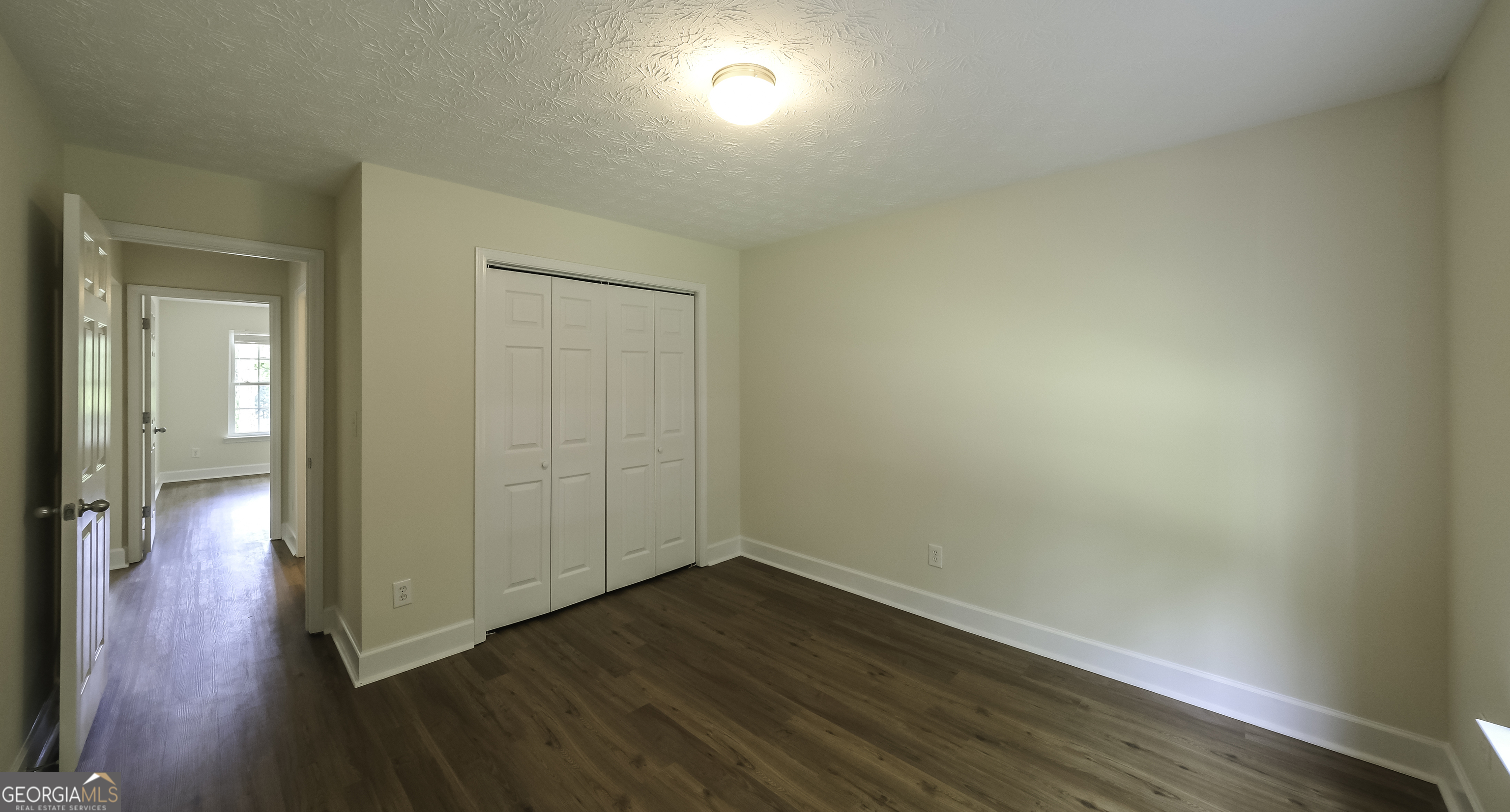 191 Tumlin Creek Road Roopville, GA 30170 - Photo 18 of 49 wooden floor in an empty room