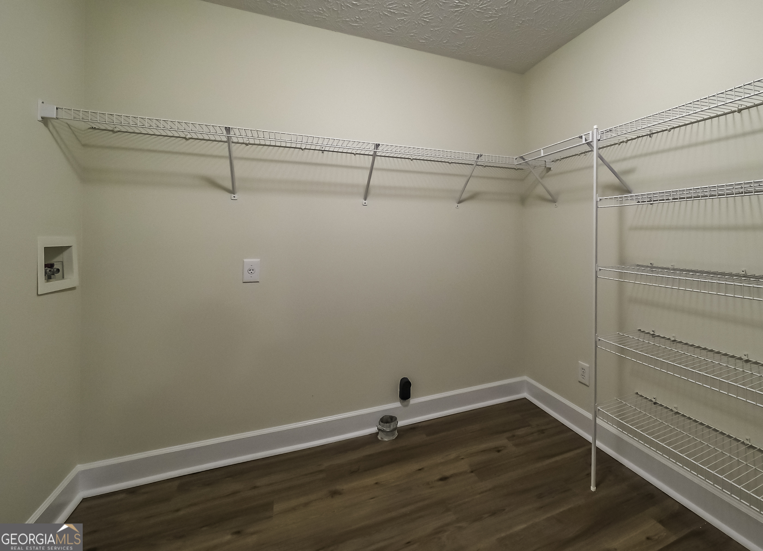 191 Tumlin Creek Road Roopville, GA 30170 - Photo 25 of 49 a view of a room with racks on the wall