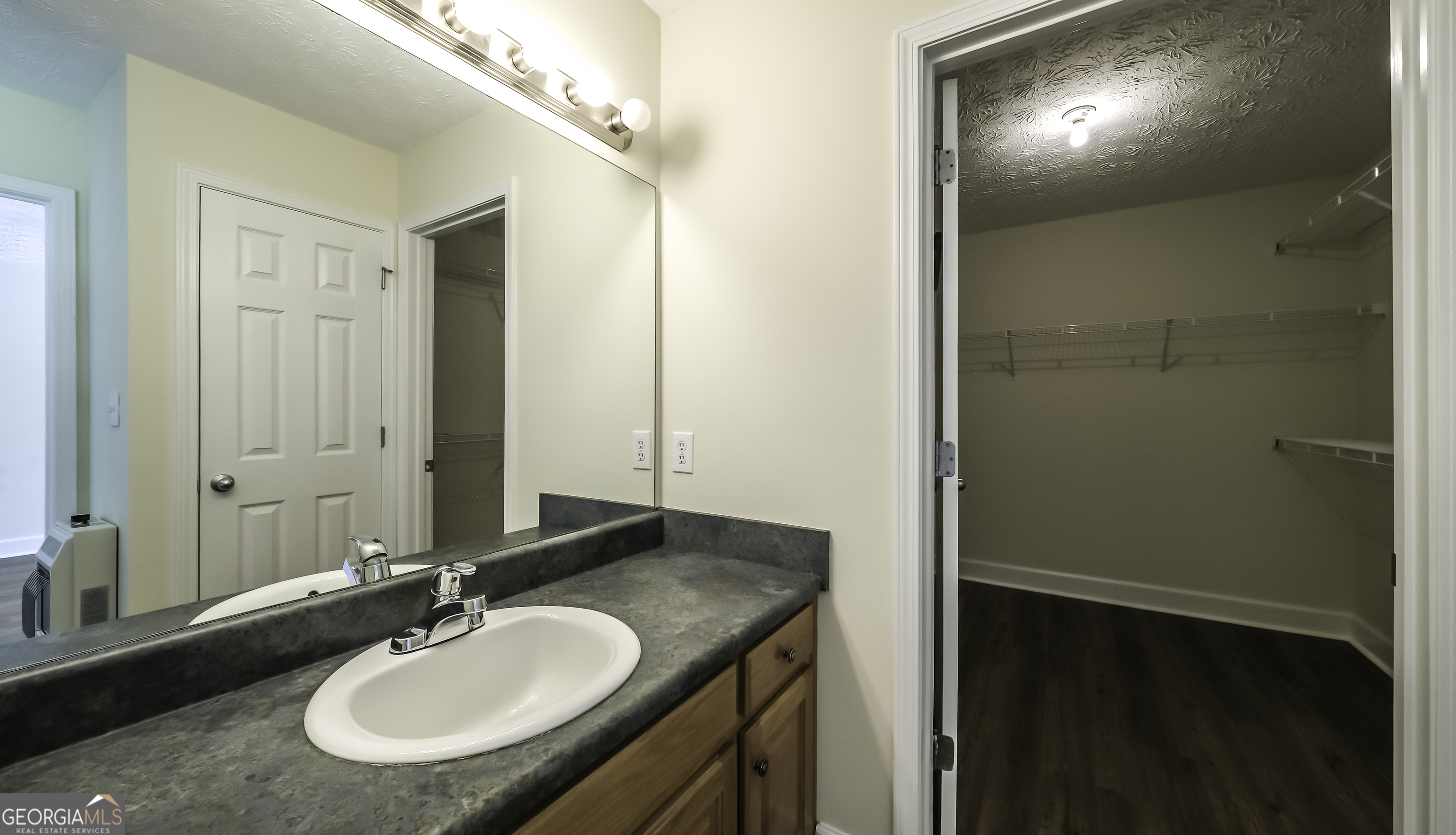 191 Tumlin Creek Road Roopville, GA 30170 - Photo 27 of 49 a bathroom with a sink and a mirror