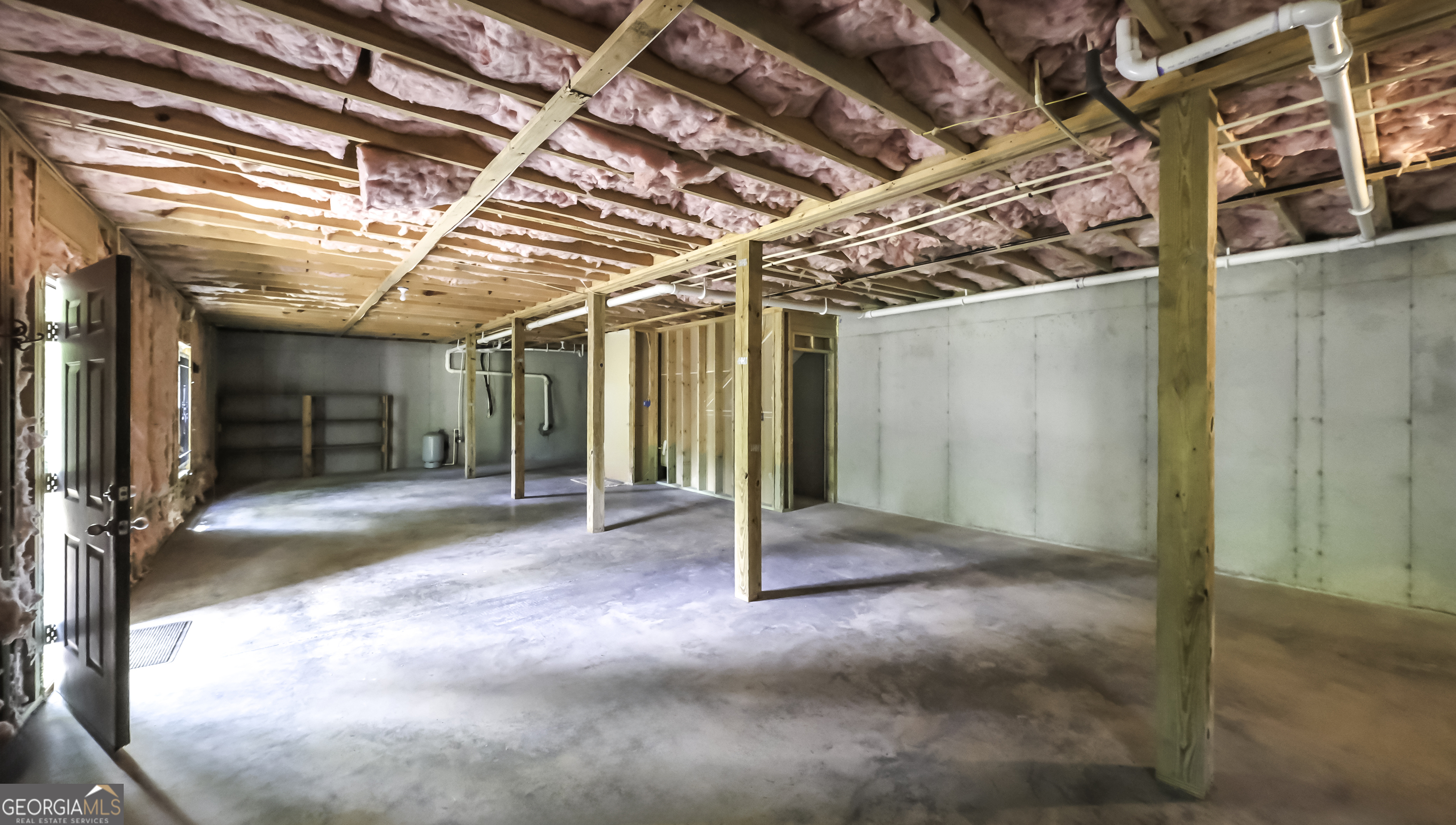191 Tumlin Creek Road Roopville, GA 30170 - Photo 30 of 49 a view of a room with wooden walls