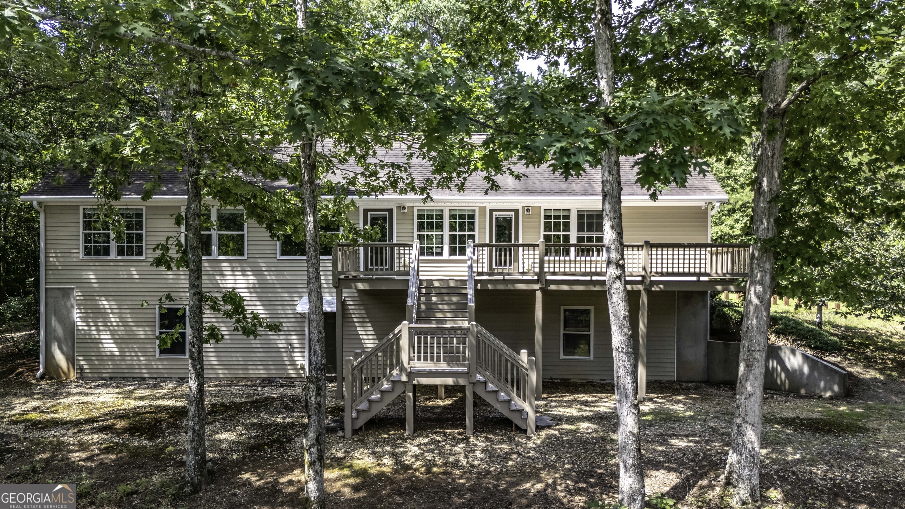 191 Tumlin Creek Road Roopville, GA 30170 - Photo 3 of 49 a front view of a house with a porch