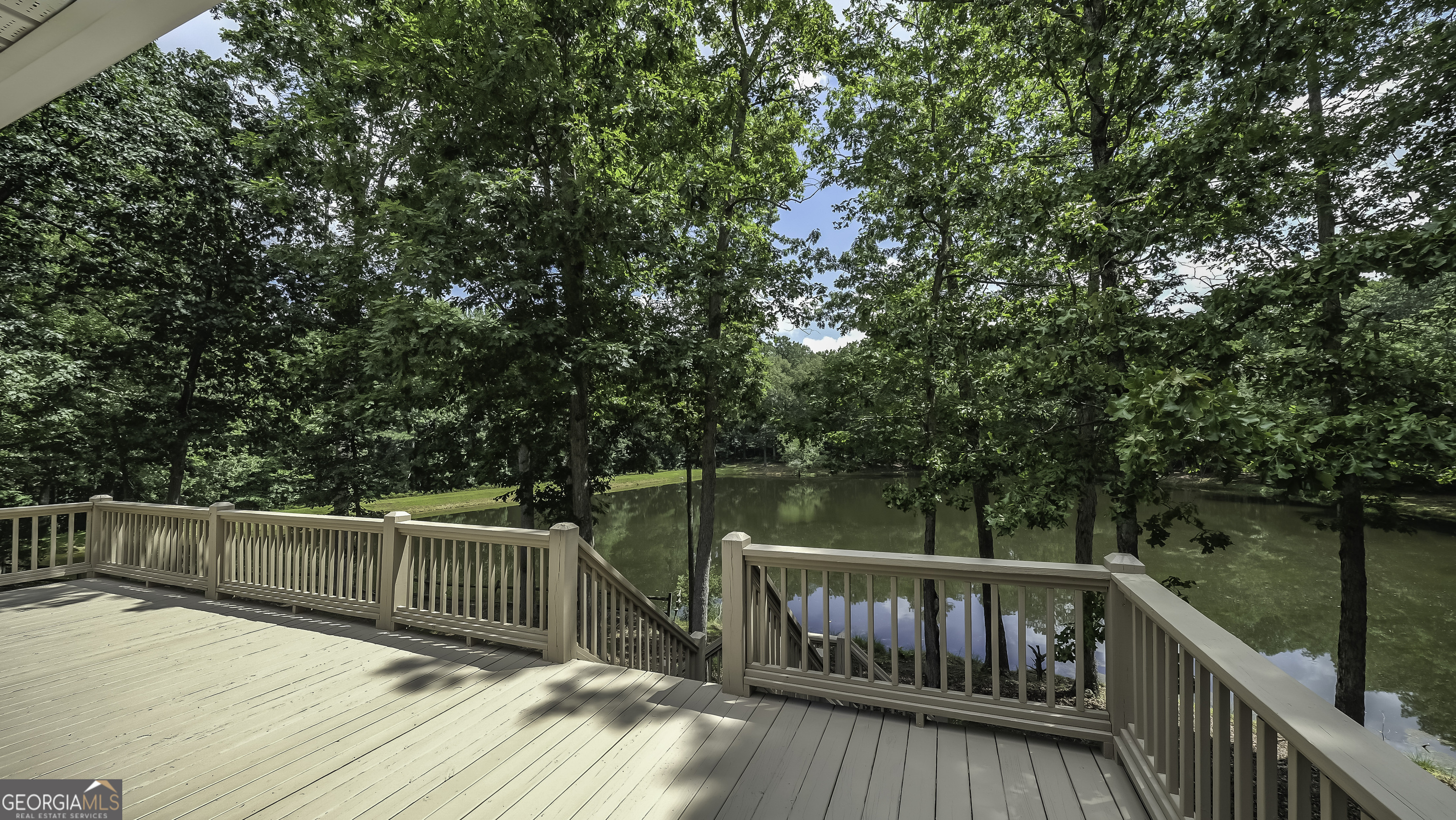 191 Tumlin Creek Road Roopville, GA 30170 - Photo 31 of 49 a view of deck with trees and wooden fence