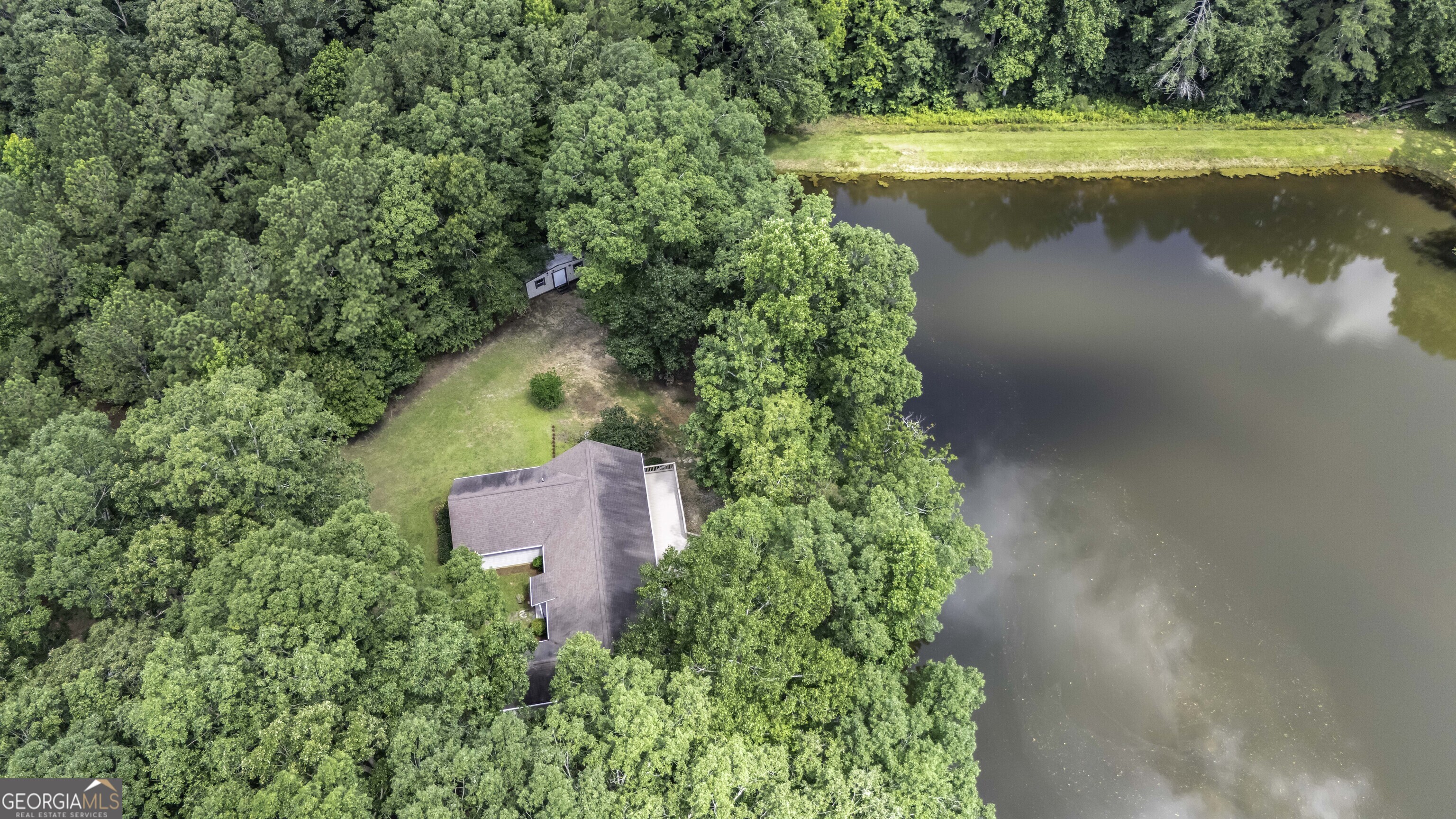 191 Tumlin Creek Road Roopville, GA 30170 - Photo 36 of 49 a view of a yard with a fountain