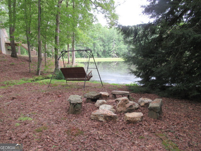 191 Tumlin Creek Road Roopville, GA 30170 - Photo 40 of 49 a view of a park with large trees