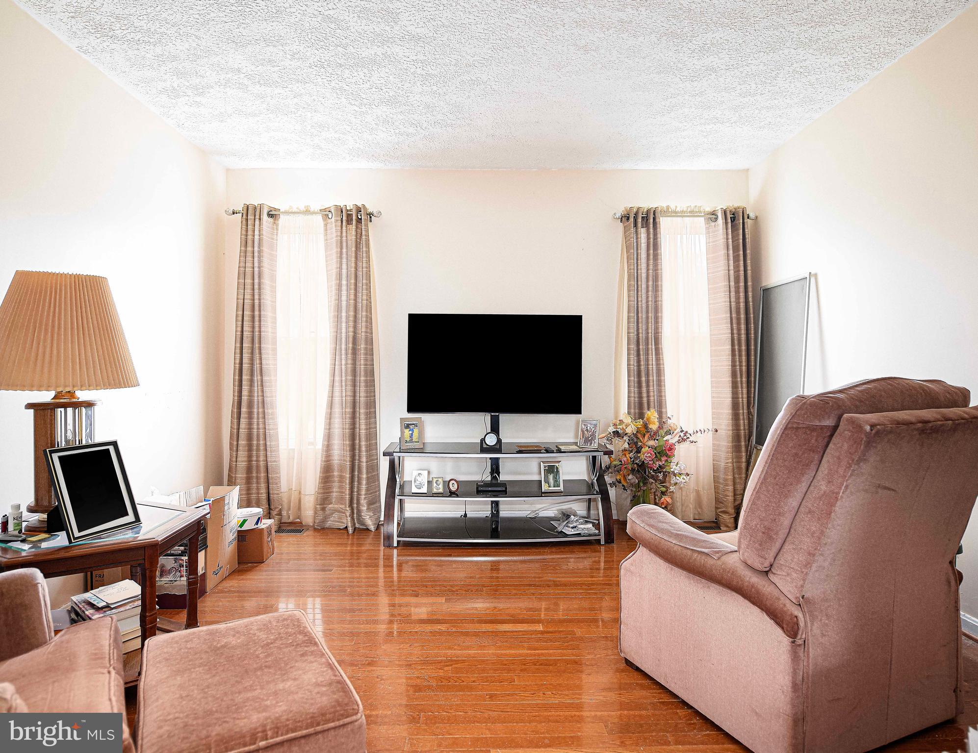 1415 Valley Forge Way Abingdon, MD 21009 - Photo 18 of 35 a living room with furniture and a flat screen tv