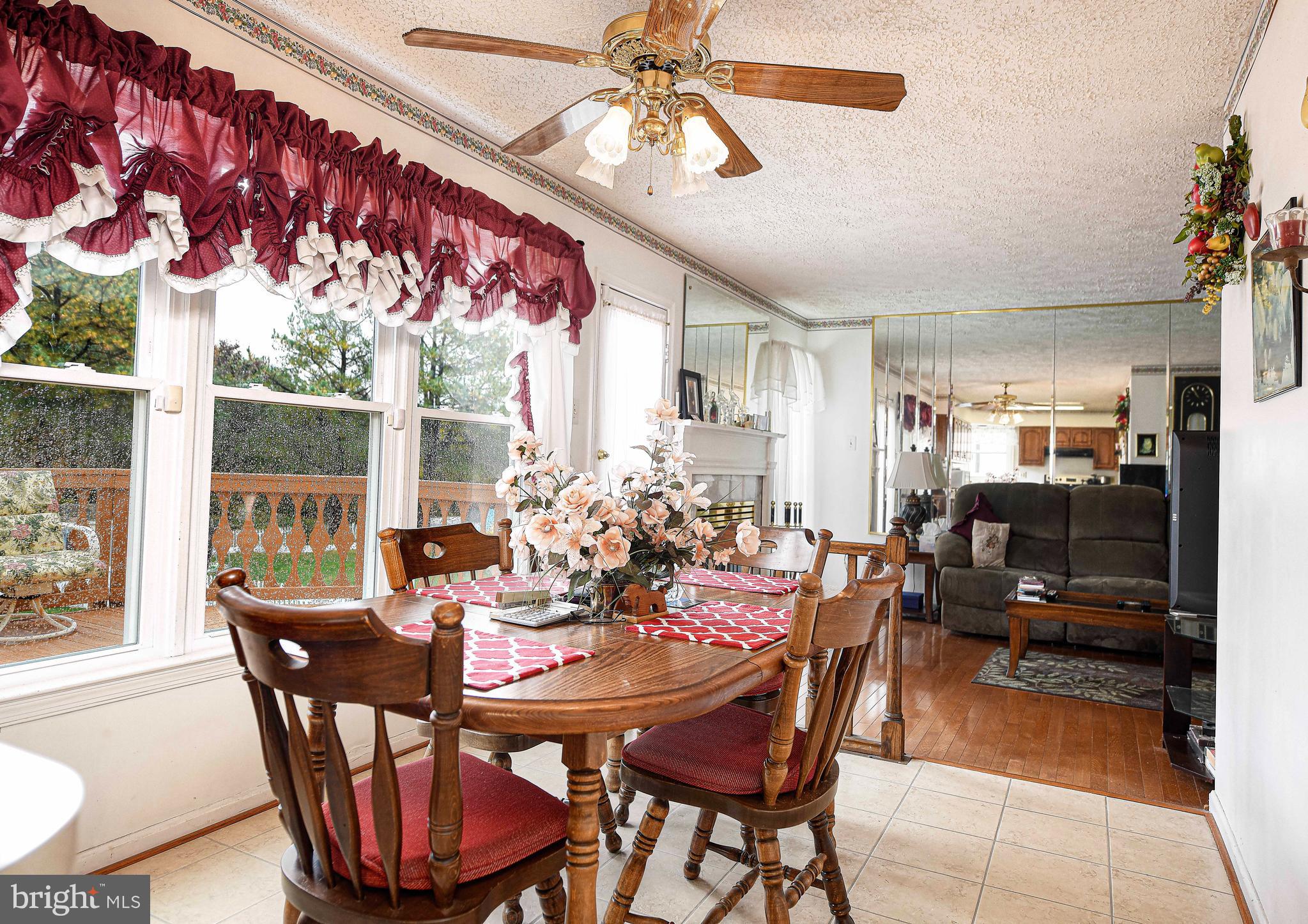 1415 Valley Forge Way Abingdon, MD 21009 - Photo 5 of 35 a view of a dining room with furniture window and outside view