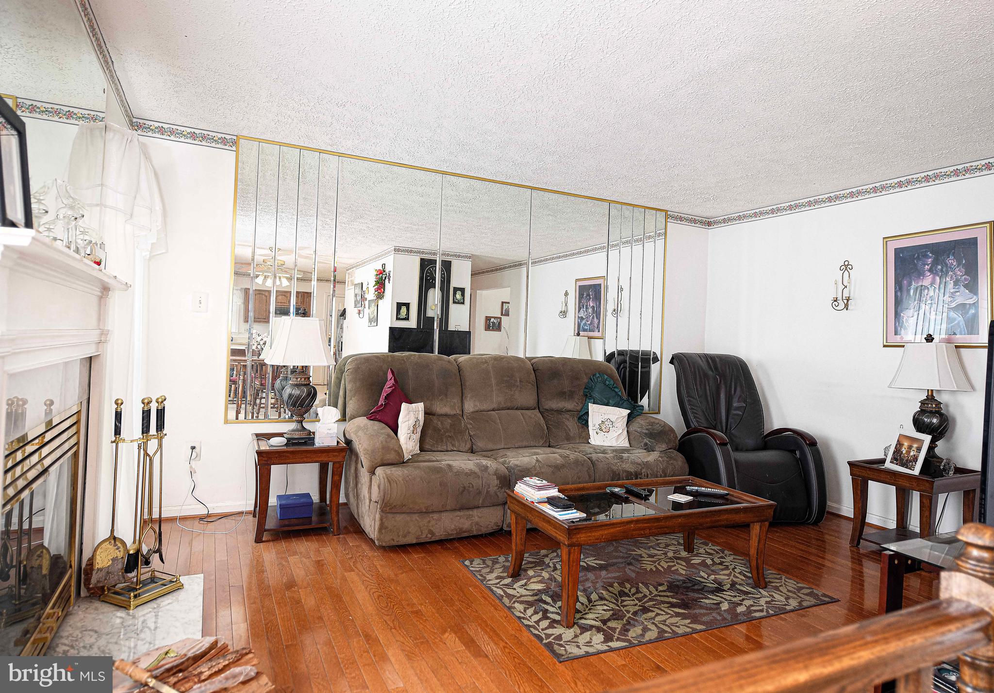 1415 Valley Forge Way Abingdon, MD 21009 - Photo 7 of 35 a living room with furniture a rug and a flat screen tv
