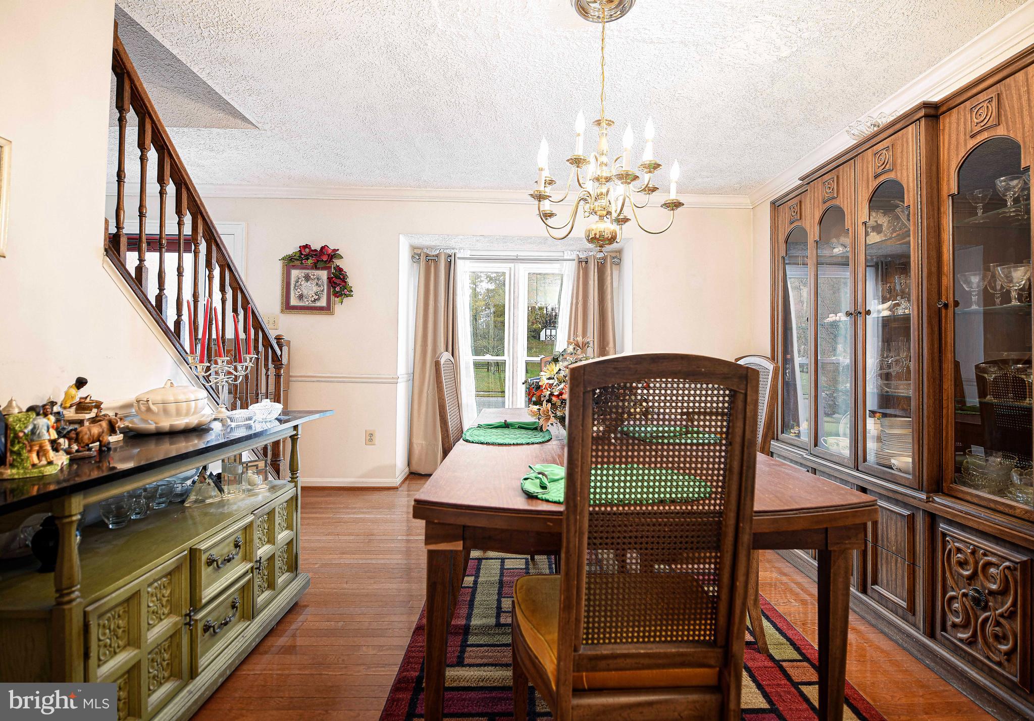 1415 Valley Forge Way Abingdon, MD 21009 - Photo 10 of 35 a view of a dining room with furniture and a chandelier