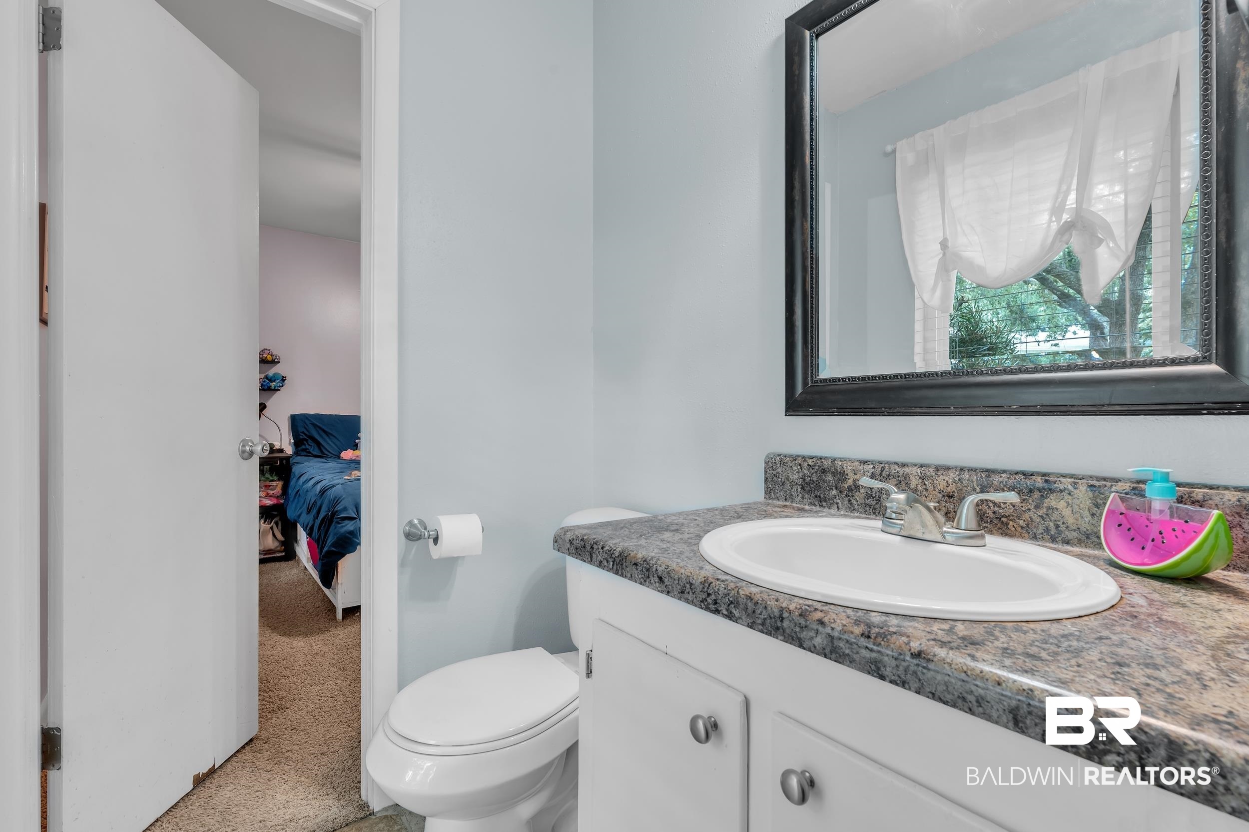 224 Cache Circle Mobile, AL 36611 - Photo 25 of 42 Bathroom with vanity, toilet, and connected bathroom