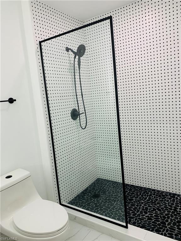 4180 5th Avenue Southwest Naples, FL 34119 - Photo 20 of 33 a bathroom with a shower
