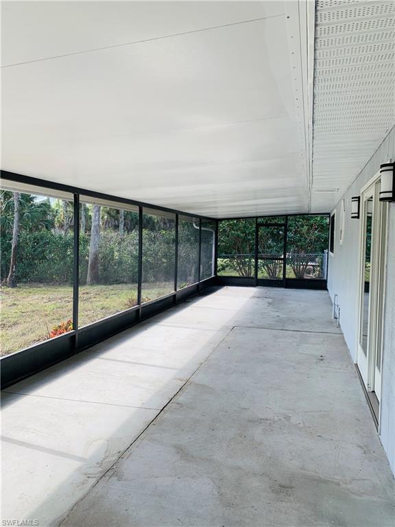 4180 5th Avenue Southwest Naples, FL 34119 - Photo 28 of 33 a view of an empty room with a balcony