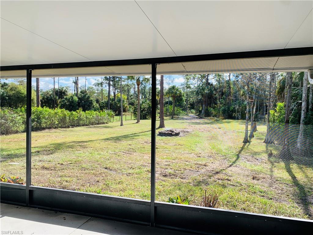 4180 5th Avenue Southwest Naples, FL 34119 - Photo 31 of 33 a view of a room with a large window