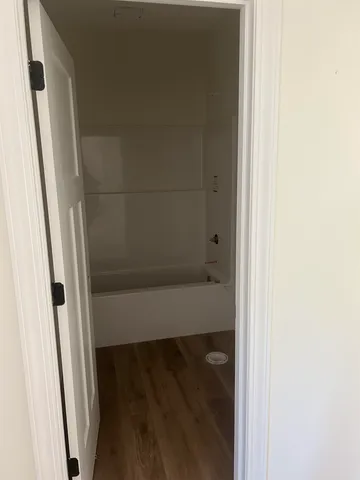 a bathroom with a bathtub