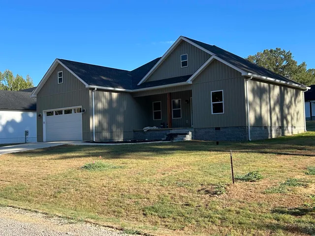 a view of a swimming pool with a chair
