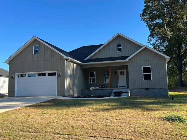 a front view of house with yard
