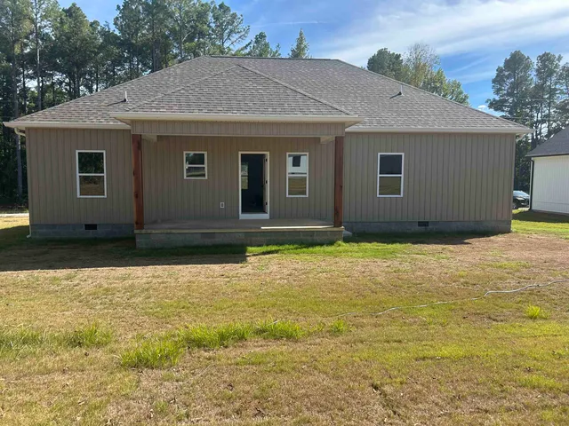 a house with yard in front of it