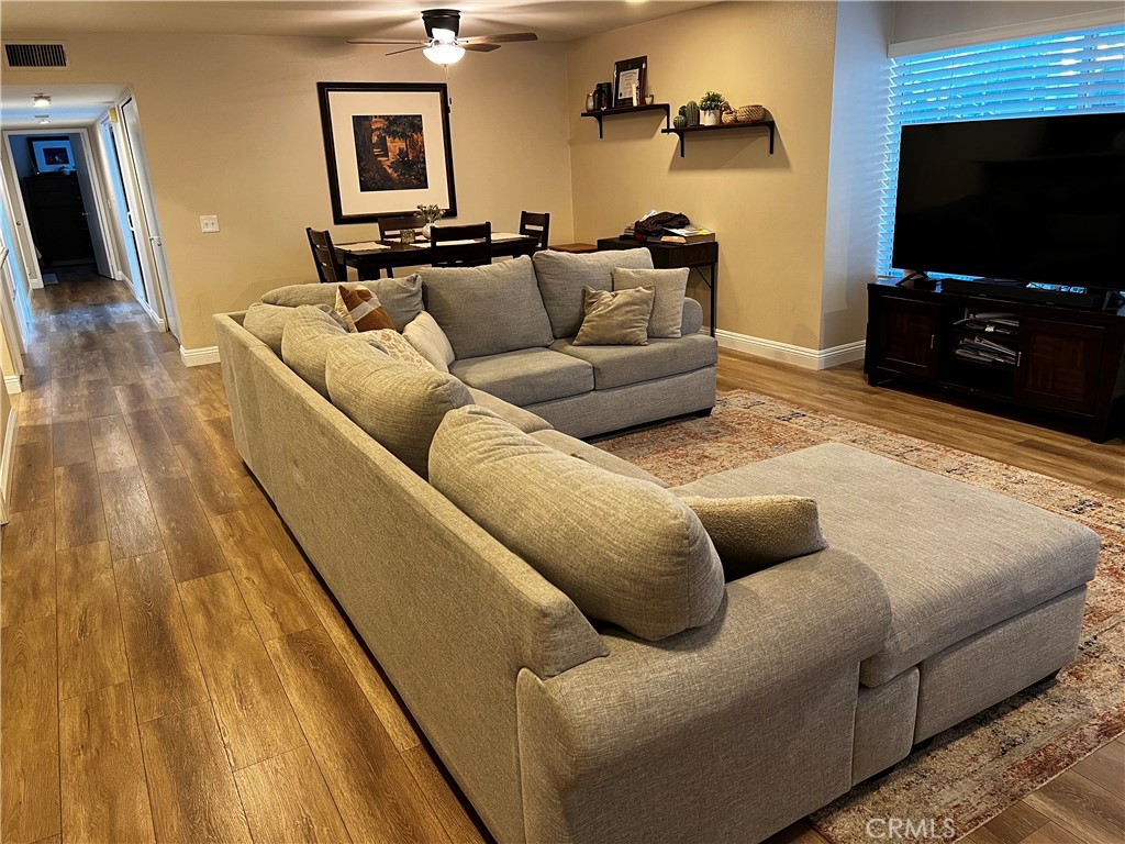 1507 Spruce Street, Unit A Placentia, CA 92870 - Photo 2 of 4 a living room with furniture and a flat screen tv
