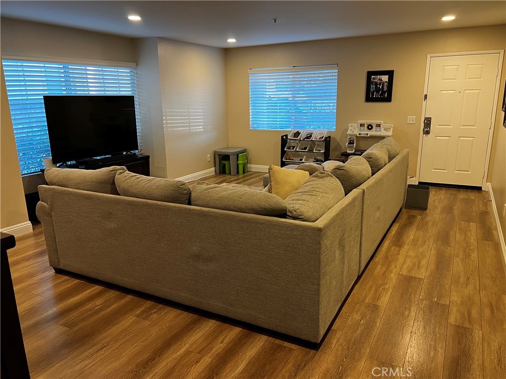 1507 Spruce Street, Unit A Placentia, CA 92870 - Photo 3 of 4 a living room with furniture and a flat screen tv