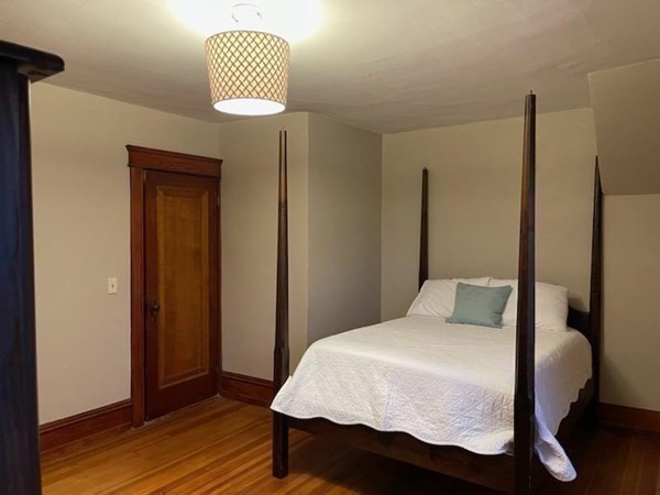 85 Wingold Street Fall River, MA 02720 - Photo 23 of 24 a bedroom with a bed and a chair