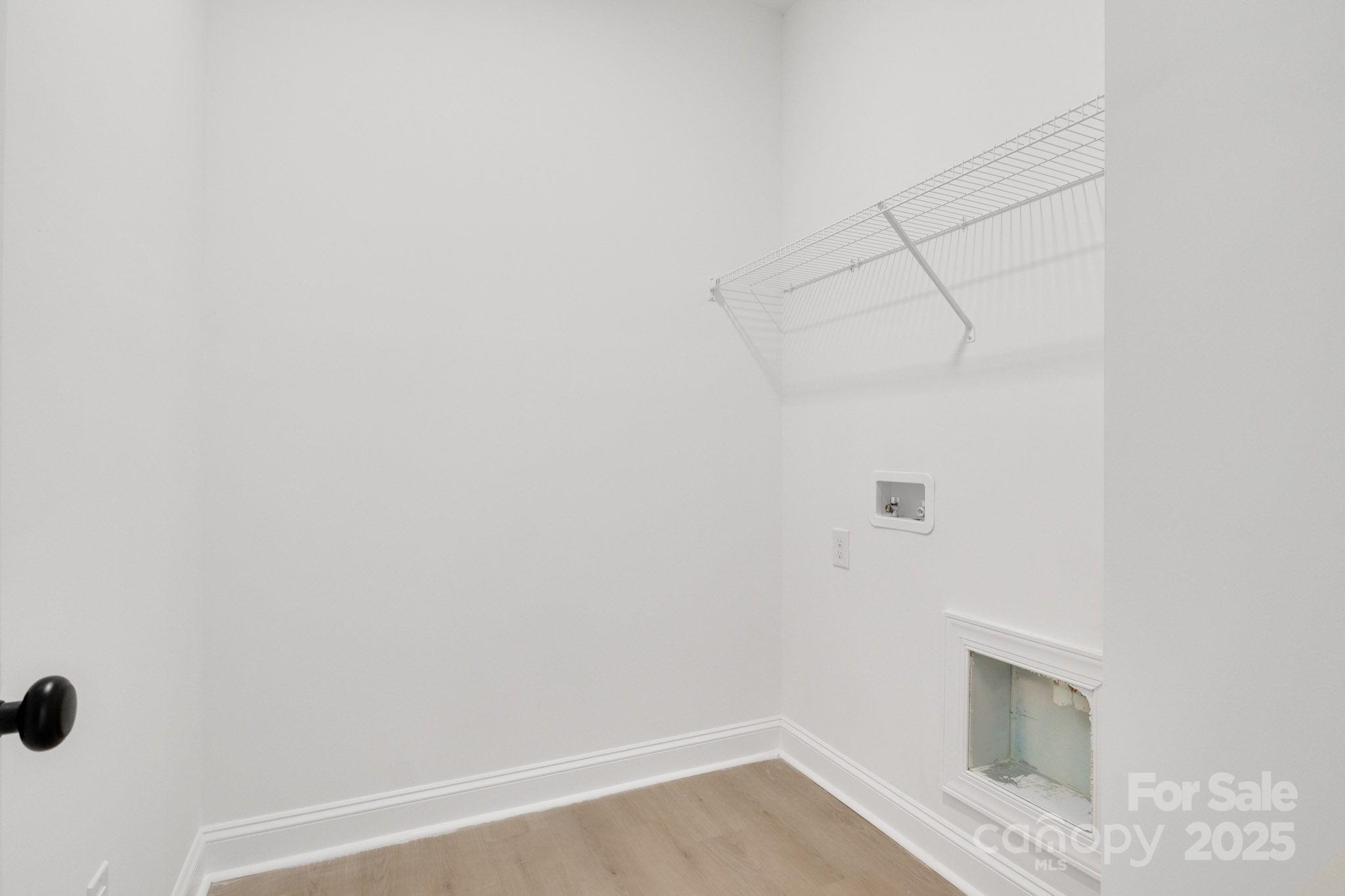 540 Church Street Locust, NC 28097 - Photo 21 of 25 a view of a room with rack on the wall