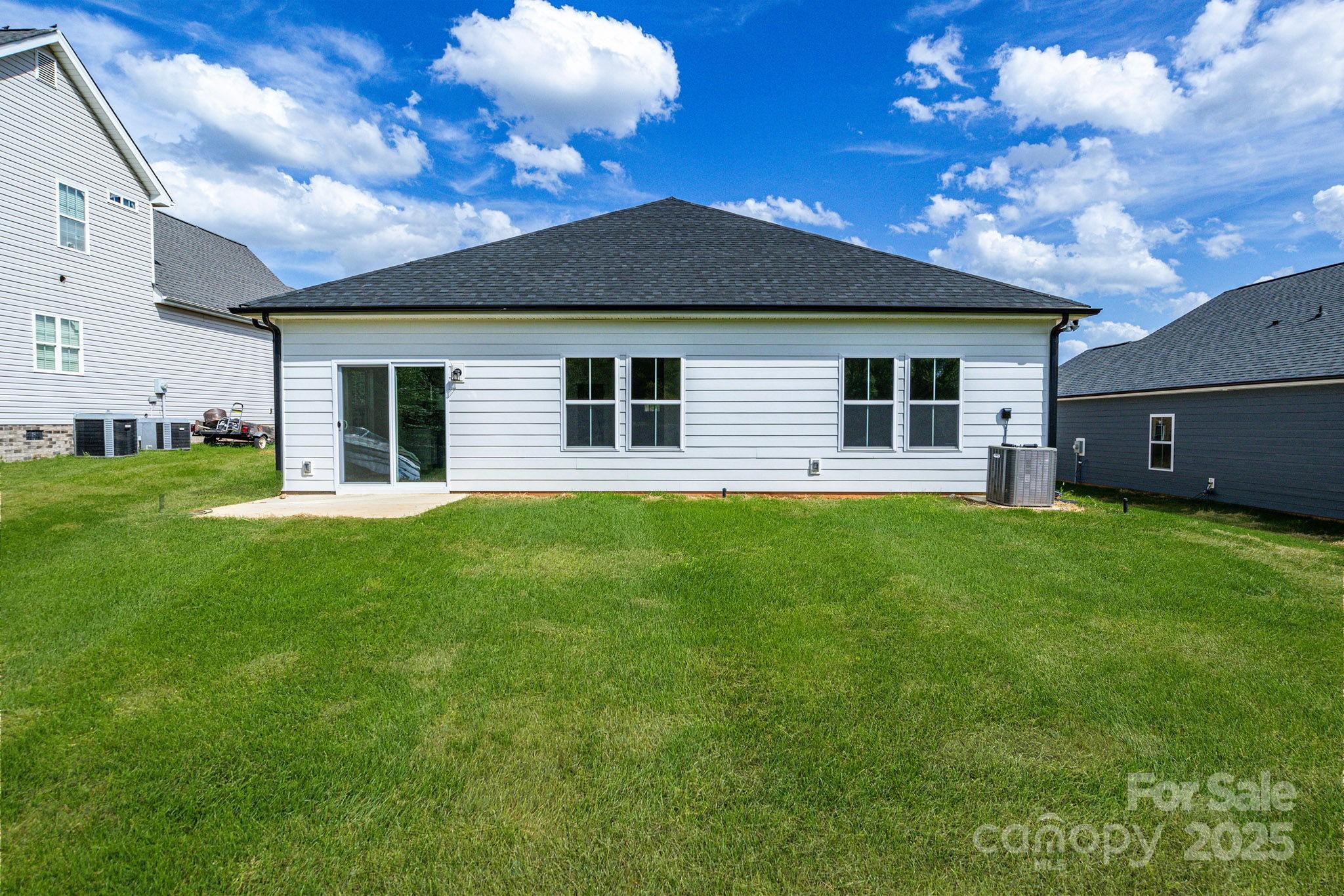 540 Church Street Locust, NC 28097 - Photo 23 of 25 a front view of house with yard and green space