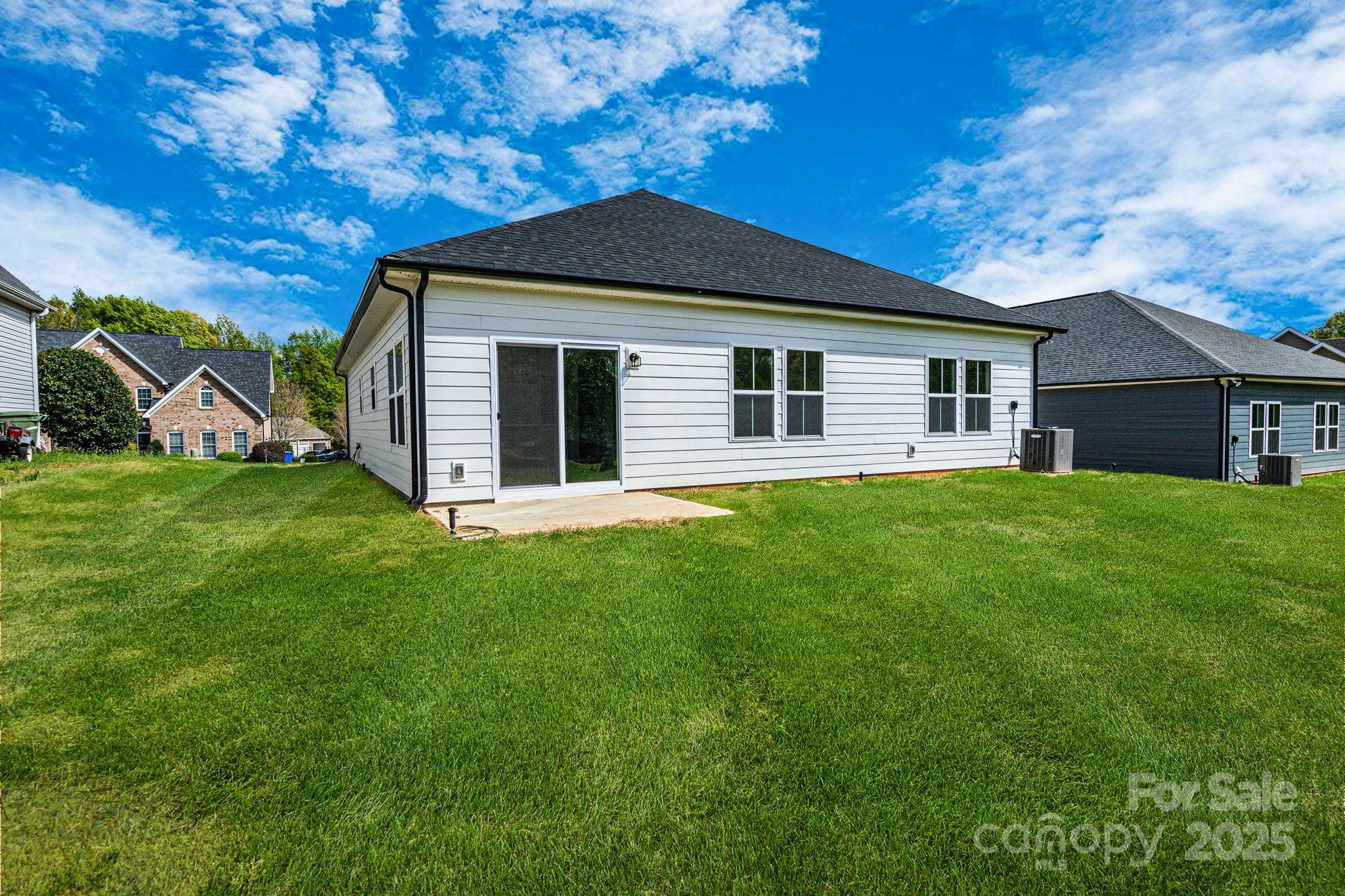 540 Church Street Locust, NC 28097 - Photo 25 of 25 a front view of a house with yard and green space