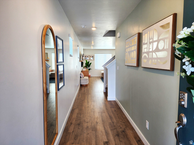 1736 East Fall Street Eagle Mountain, UT 84005 - Photo 3 of 30 Corridor featuring baseboards and dark wood-type flooring