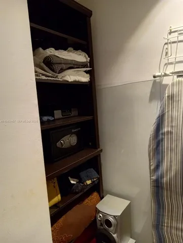 a room with a fireplace and a desk