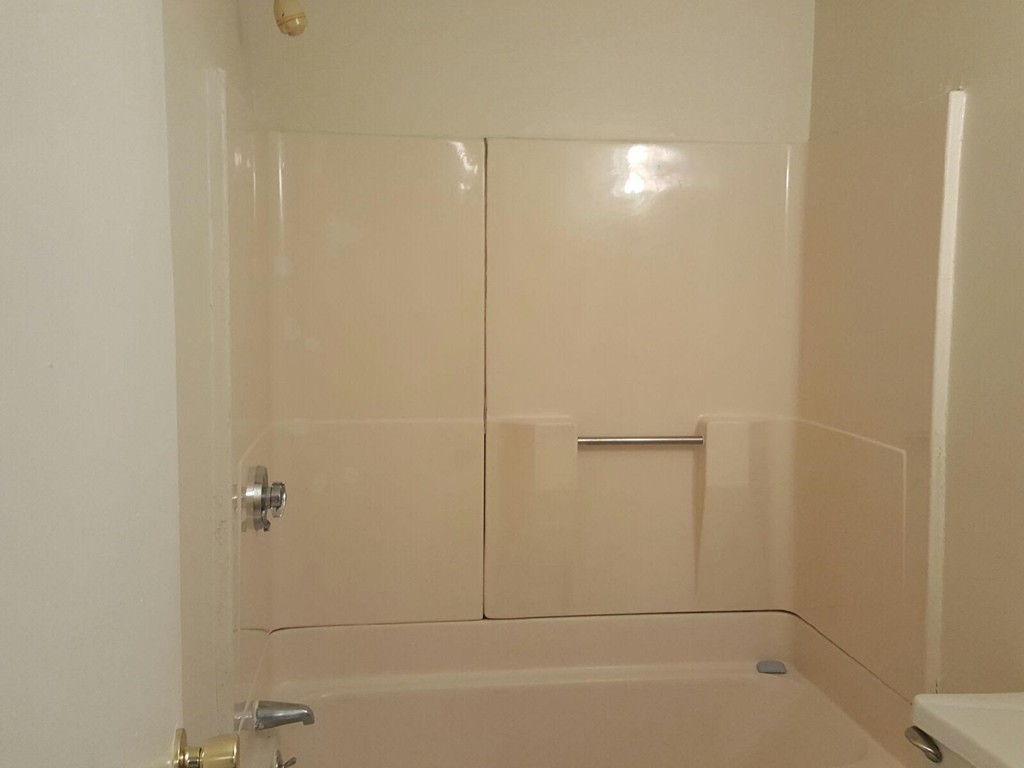 128 Cedar Street Springfield, MA 01105 - Photo 14 of 17 a bathroom with a bathtub