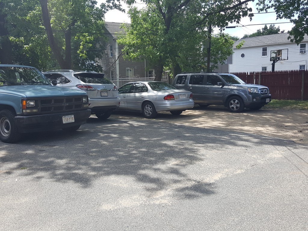 128 Cedar Street Springfield, MA 01105 - Photo 2 of 17 a view of street with parked cars