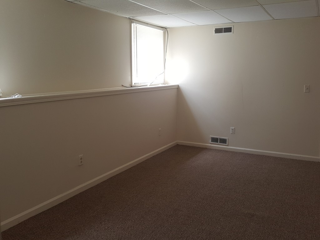128 Cedar Street Springfield, MA 01105 - Photo 7 of 17 an empty room with a window