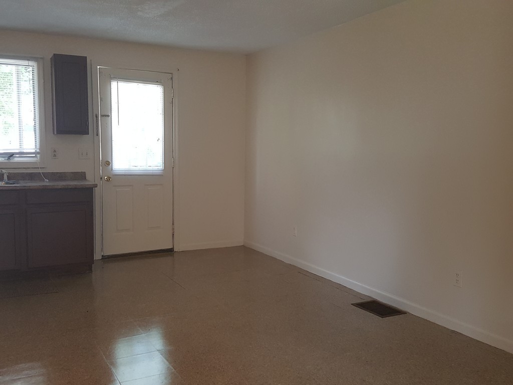 128 Cedar Street Springfield, MA 01105 - Photo 8 of 17 an empty room with windows