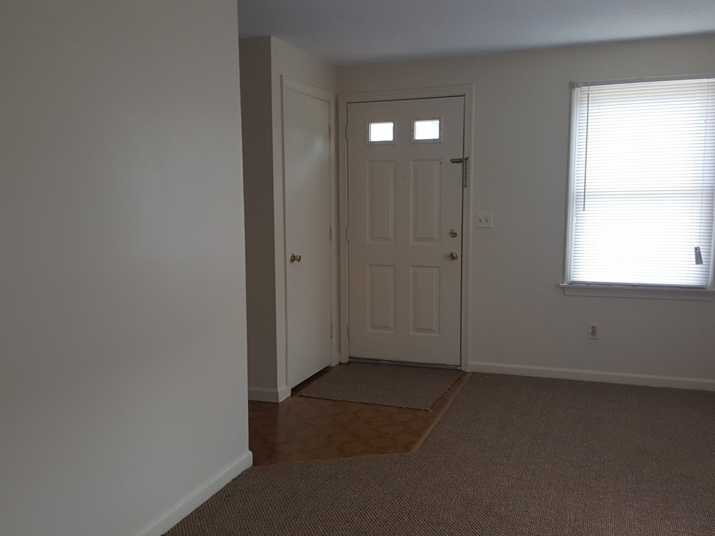 128 Cedar Street Springfield, MA 01105 - Photo 10 of 17 an empty room with windows